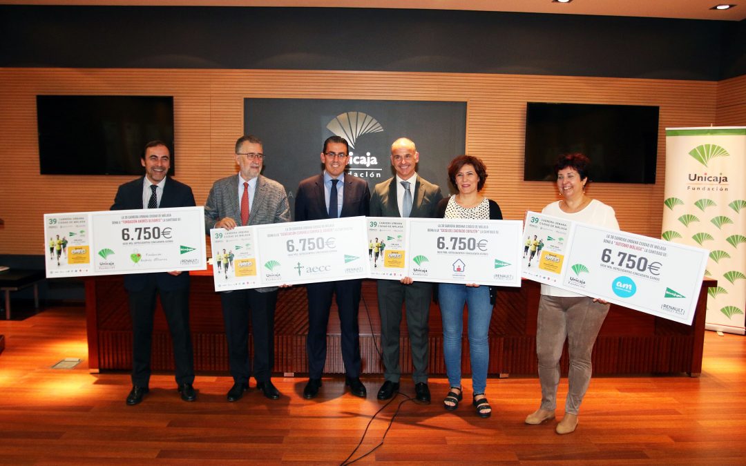 Fundación Unicaja entrega los 27.000 euros recaudados en la Carrera Ciudad de Málaga